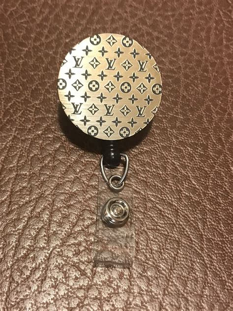 porta badge louis vuitton